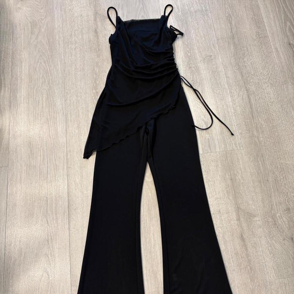 Y2k Charlotte Russe jumpsuit with mesh overlay and cowl neck. Size medium